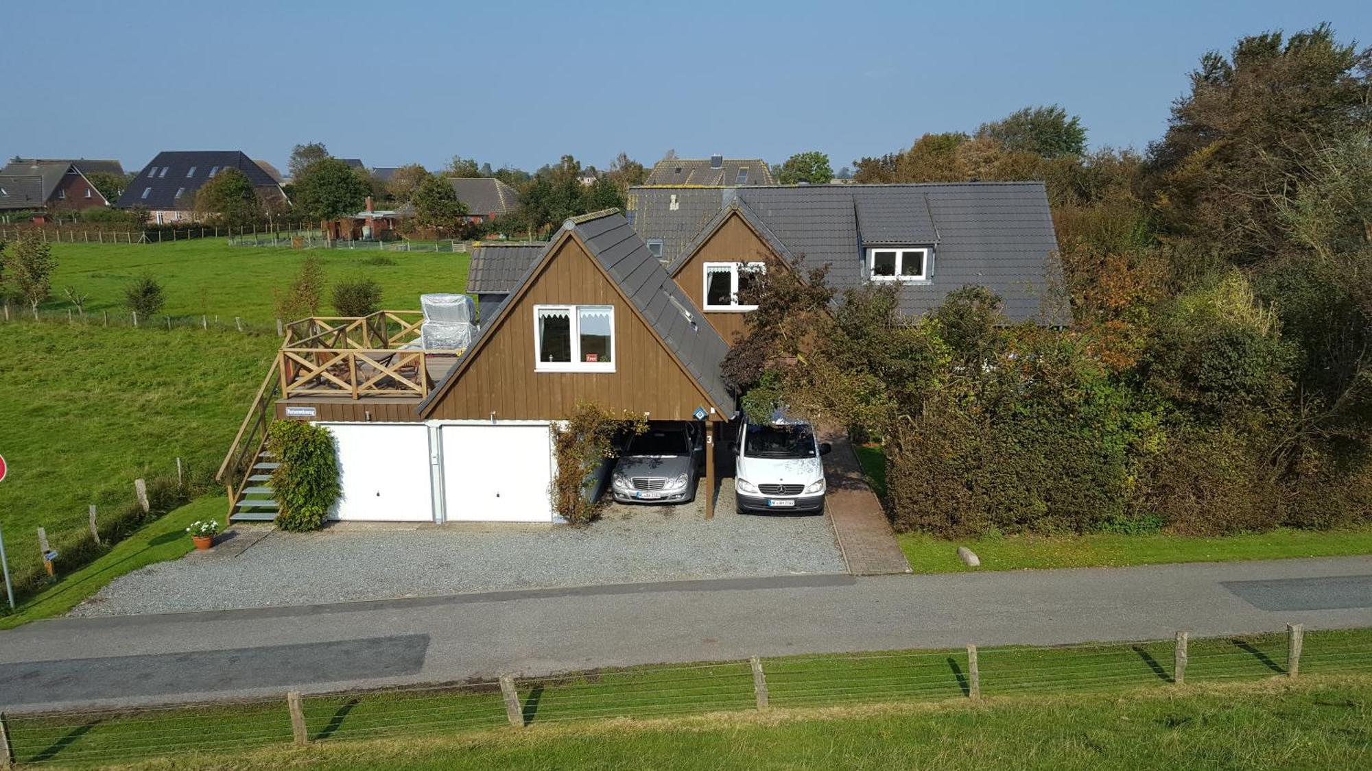 Ferienwohnungen Am Aussendeich Nordstrand Exterior foto